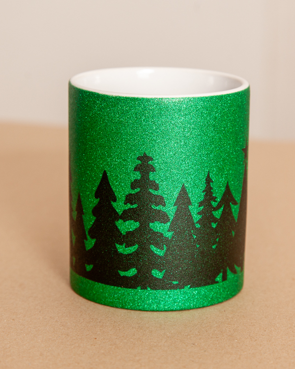 päfjes - Tannenbäume / Weihnachten auf grüner Glitzer-Tasse